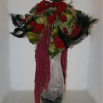 Feuilles de cordyline, célosie et roses rouges, sedums et amarantes queue de renard: 1er prix de la categorie Carnavals.
