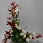 Le port dressé du feuillage de photinia est apprécié pour structurer les bouquets.