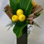 Palmes plissées et feuilles en carton ondulé, les citrons s'intègrent à tous les styles de bouquets.
